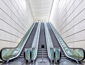 What Is the Difference Between a Lift Escalator and Horizontal Moving Walk Escalator?